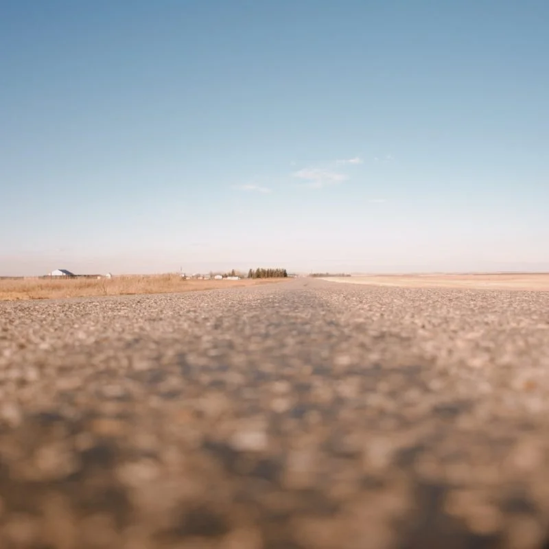 brown concrete road during daytime