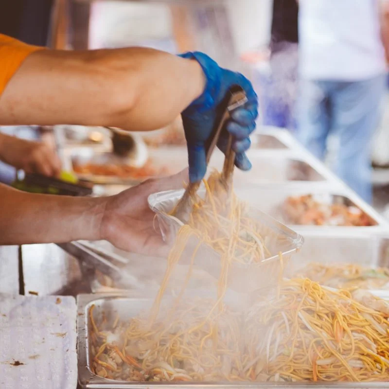 A man serving street food in Letchworth Garden City