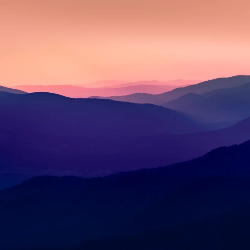 silhouette of mountains during sunset