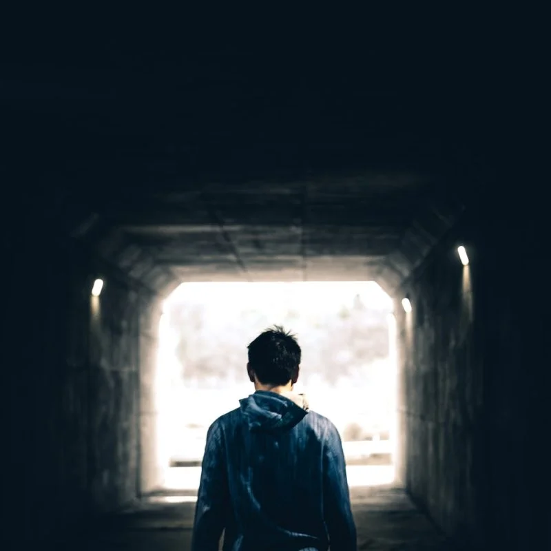 man standing in subway