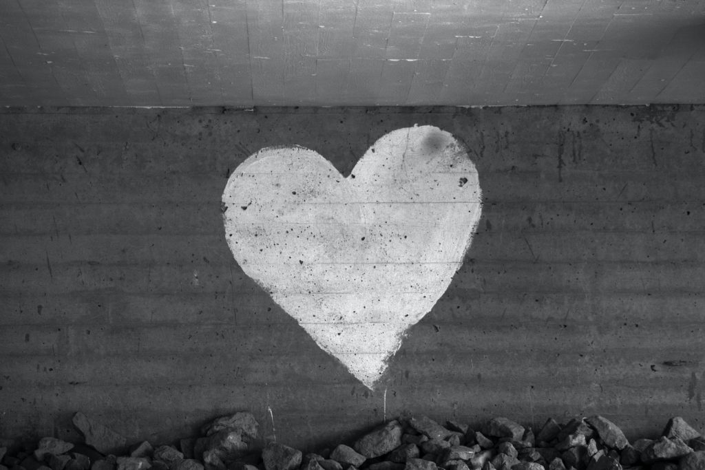 heart shaped concrete wall with heart shaped shadow