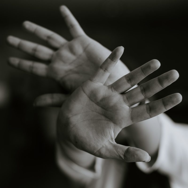 person stretching their hands
