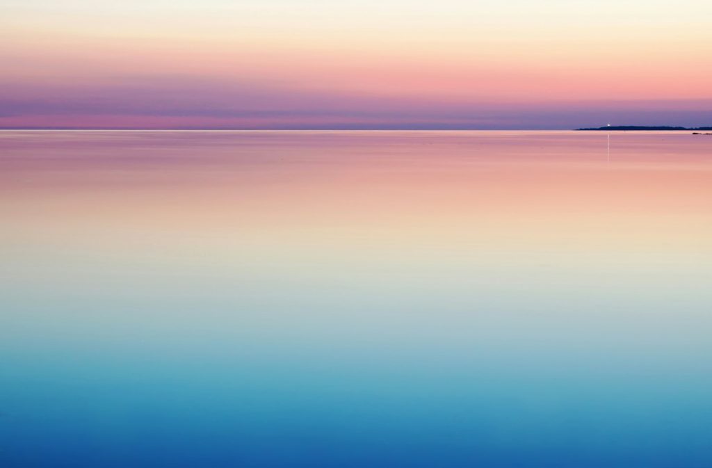 photo of blue and pink sea